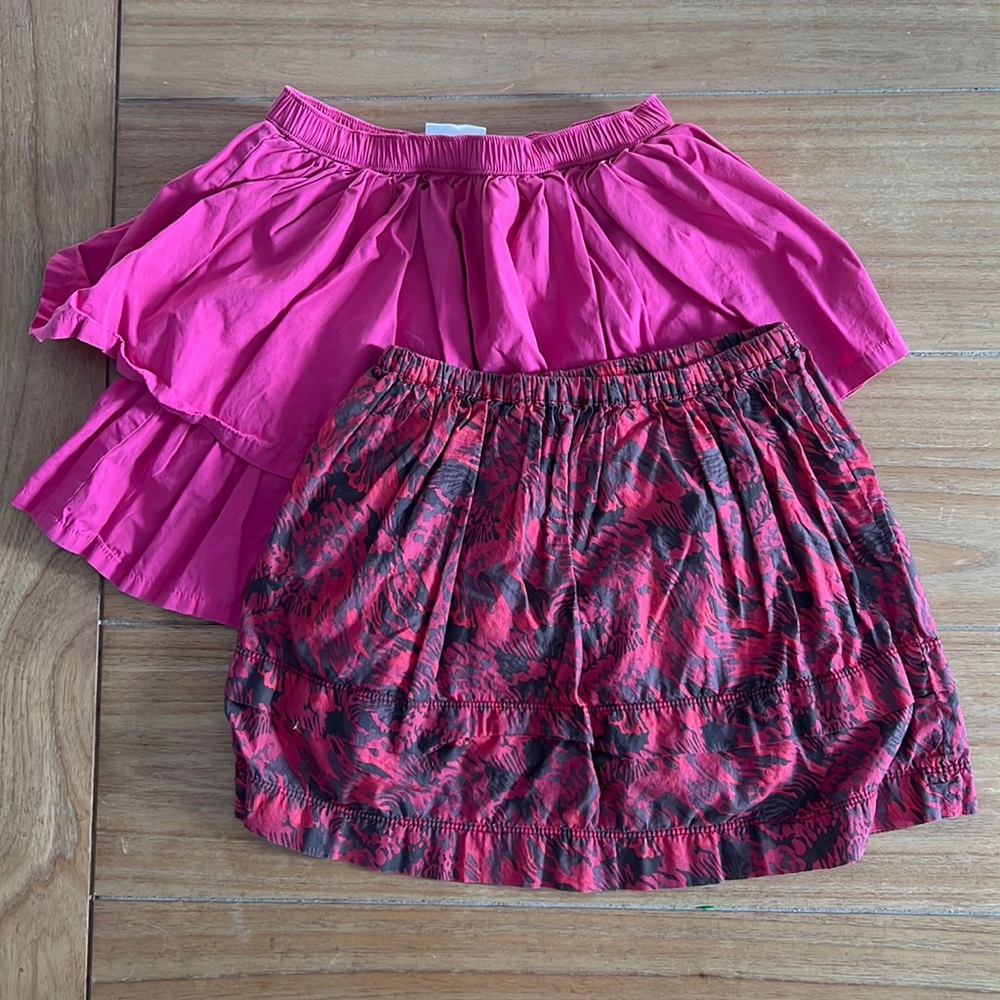 Peek Skirt, Size M (6-7), and Hanna Andersson Tiered Skirt, Size 8.